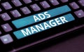 Sign displaying Ads Manager. Business overview oversee and control the various advertising activities