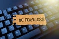 Writing displaying text Be Fearless. Business concept act of striving to lead an extraordinary life and make a Royalty Free Stock Photo