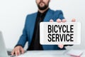 Sign displaying Bicycle Service. Business overview offering services like bicycle rent or and maintenance Tech Guru