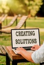 Sign displaying Creating Solutions. Business approach Make ways to solve a problem or dealing with situation Online Jobs