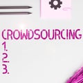 Sign displaying Crowdsourcing. Business idea Obtaining work information from a large group of people