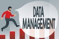Sign displaying Data Management. Word Written on The practice of organizing and maintaining data processes Debugging Royalty Free Stock Photo