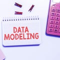 Writing displaying text Data Modeling. Business overview process of transferring data between data storage systems Royalty Free Stock Photo