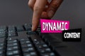 Sign displaying Dynamic Content. Internet Concept web content that changes based on the behavior of the user Hands Royalty Free Stock Photo