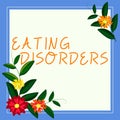 Sign displaying Eating Disordersany of a range of psychological abnormal food habits. Word Written on any of a range of