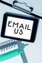 Sign displaying Email Us. Word Written on Sending a commercial message to a group of people using mail