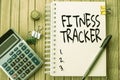 Sign displaying Fitness Tracker. Internet Concept device that records a persons daily physical activity Plain Spiral