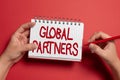 Sign displaying Global Partners. Word for Two or more firms from different countries work as a team Writing New Ideas Royalty Free Stock Photo