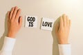Sign displaying God Is Love. Internet Concept Believing in Jesus having faith religious thoughts Christianity