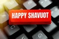 Sign displaying Happy Shavuot. Internet Concept Jewish holiday commemorating of the revelation of the Ten Commandments