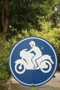 Sign displaying the international symbol for a motorcycle Royalty Free Stock Photo