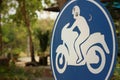 Sign displaying the international symbol for a motorcycle Royalty Free Stock Photo