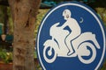 Sign displaying the international symbol for a motorcycle Royalty Free Stock Photo