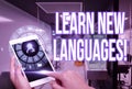 Text caption presenting Learn New Languages. Business concept developing ability to communicate in foreign lang Woman Royalty Free Stock Photo