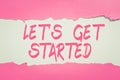 Sign displaying Lets Get Started. Word Written on encouraging someone to commence or begin doing something