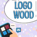 Sign displaying Logo Wood. Internet Concept Recognizable design or symbol of a company inscribed on wood