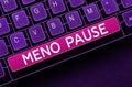 Sign displaying Meno Pause. Word for the process through which a woman ceases to be fertile or menstruate