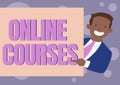 Sign displaying Online Courses. Internet Concept Revolutionizing formal education Learning through internet Happy Man In