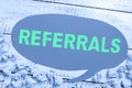 Sign displaying Referrals. Concept meaning act, action, or an instance of referring to someone for work