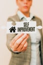 Sign displaying Self Improvement. Word Written on process of making yourself a better or more knowledgable Businesswoman Royalty Free Stock Photo