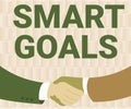 Sign displaying Smart Goals. Business concept mnemonic used as a basis for setting objectives and direction Two Men Royalty Free Stock Photo