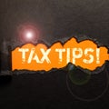 Sign displaying Tax Tips. Business idea Help Ideas for taxation Increasing Earnings Reduction on expenses