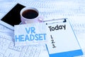 Sign displaying Vr Headset. Business showcase headmounted device that provides virtual reality for the wearer Typing New