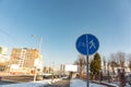 A sign that divides the path for pedestrians and bicyclists. Round blue sign Pedestrian and Bicycle path close-up Royalty Free Stock Photo