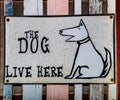 Sign dog live here