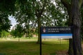 Sign for Dulwich College boys school in the school grounds on College Road