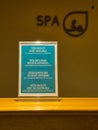 A sign in English, Portuguese, German and French advises that spa facilities are closed as part of the coronavirus lockdown