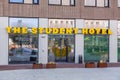 The sign and the entrance of the Student Hotel`s Delft branch, the Netherlands