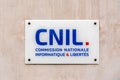 Sign at the entrance to the Commission Nationale Informatique et LibertÃ©s (CNIL), Paris, France