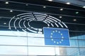 Sign and EU flag symbol on glass walls of the European Parliament Royalty Free Stock Photo