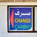 Sign for an exchange office with peeling paint for exchanging foreign currency in Tunisia Royalty Free Stock Photo