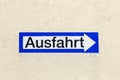 Sign exit in german painted at a wall Royalty Free Stock Photo