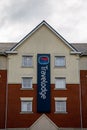 The sign on the exterior of a Travelodge hotel Royalty Free Stock Photo