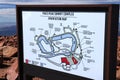A sign featuring an orientation map for the Pikes Peak Summit Complex, displaying various areas and attractions Royalty Free Stock Photo