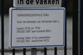 Sign on the fence of the port authority where the ship control room is for the city of Rotterdam.