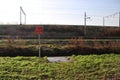 Sign for firefighters, paramedics and police where and which entrance it is to busy railroad track at Zwijndrecht.