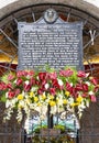 Sign with flowers,at The Cross Of Magellan Pavillion,Cebu City,Cebu,The Philippines