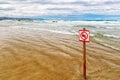 The sign forbidding to bathe on the beach.