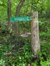 Sign in forest indicating way to animal park, Wildpark. Feldkirch, Vorarlberg, Austria. Royalty Free Stock Photo