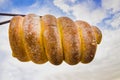 Sign in the form of traditional Czech street food - trdelnik