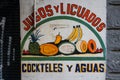 Sign for fresh juice in Mexico City. The sign translates from Spanish `Juices and smoothies, mixes and waters`