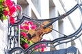 Sign in front of the shop of a violin manufacterer in Aachen in Royalty Free Stock Photo