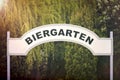 Sign with german inscription `Biergarten` meaning beer garden.