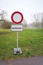 Sign with the German inscription Hochwasser, High water