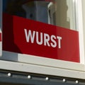 Sign with the German inscription Wurst, Sausage on the window of a butcher\'s shop