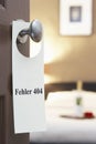 Sign with German text Fehler 404 (error 404) hanging on hotel room door Royalty Free Stock Photo